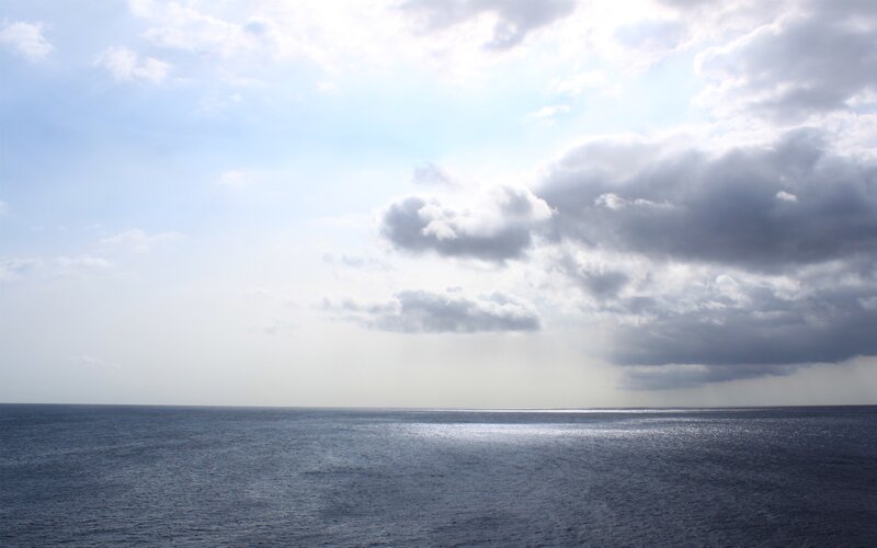 Ocean under Cloudy Sky — Blue