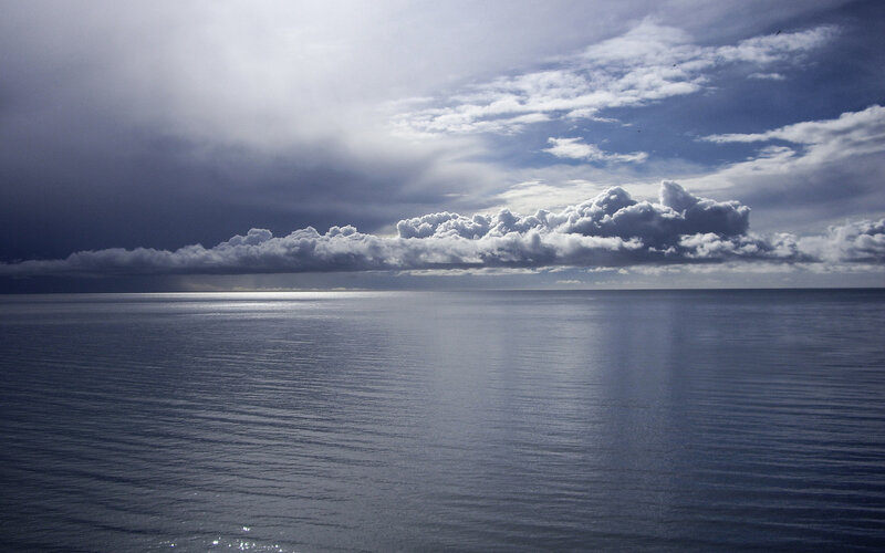 Ocean under Storm Clouds — Blue, Dramatic, Photograph