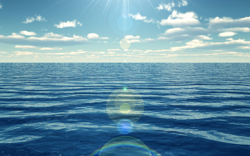 Ocean under sunny sky