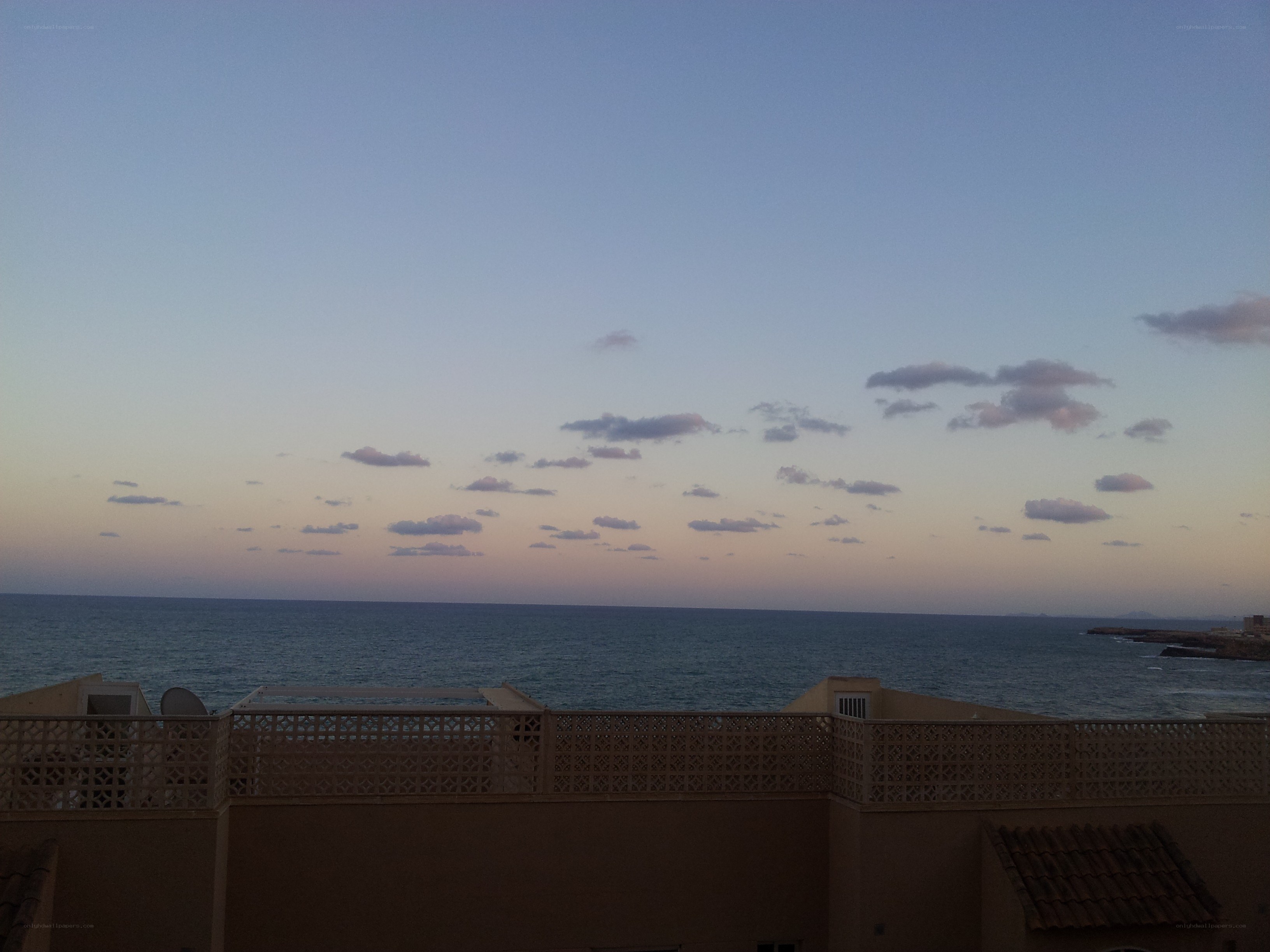Ocean view at dusk from balcony