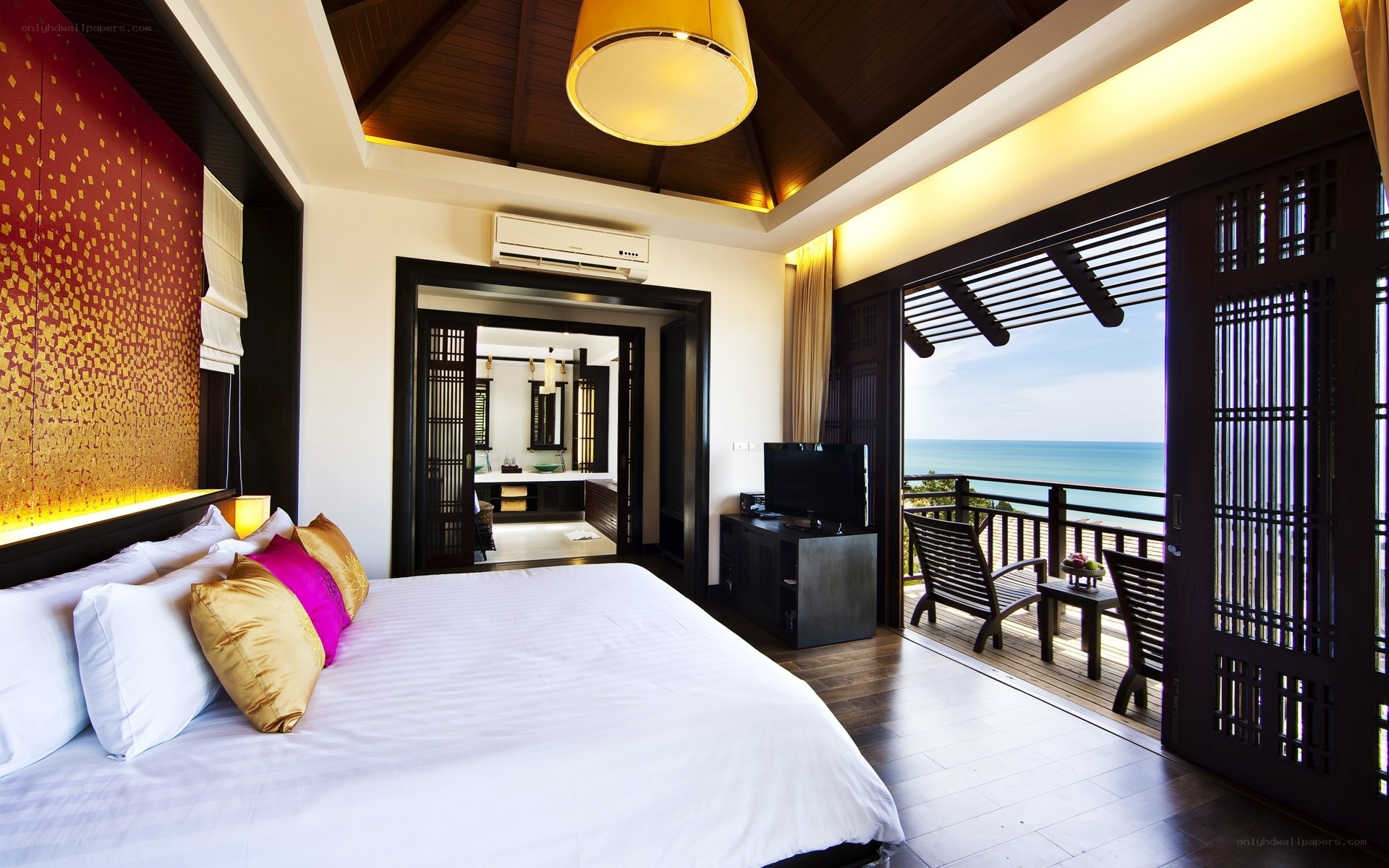 Ocean-view bedroom with balcony