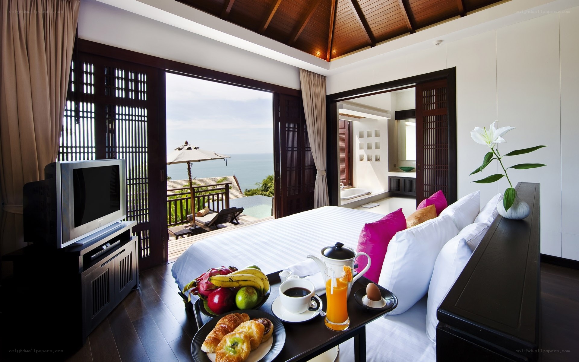 Ocean-view bedroom with breakfast