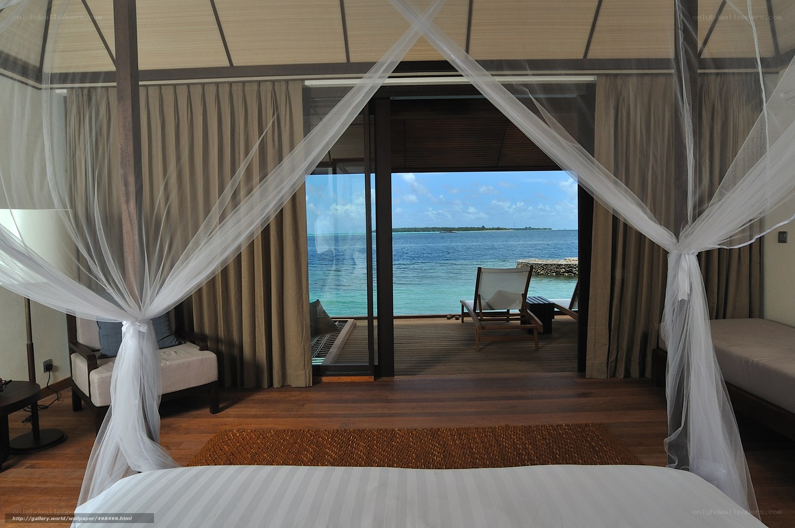 Ocean view bedroom with canopy