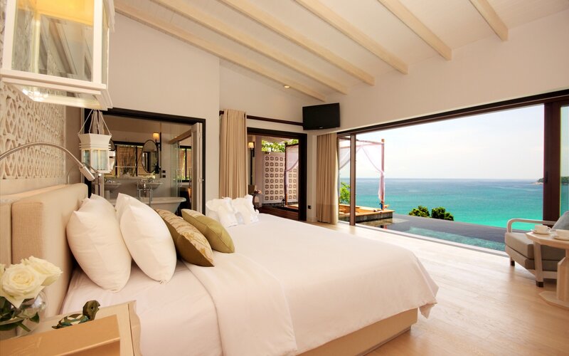 Ocean-view bedroom with infinity pool