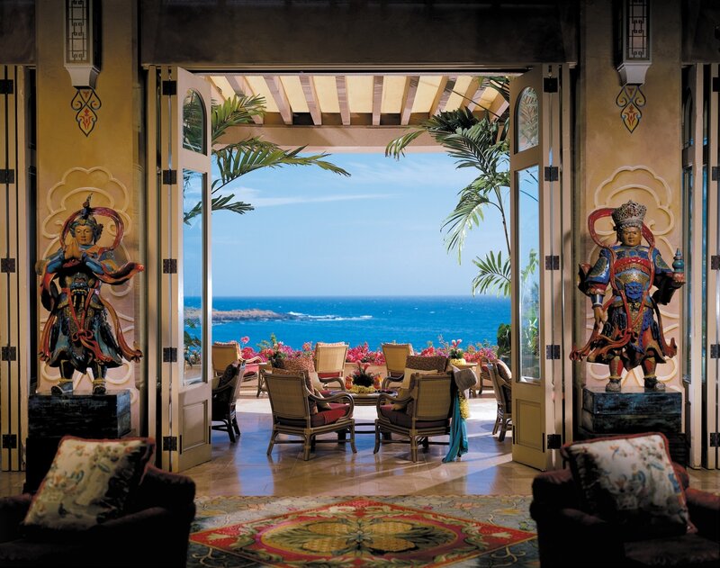 Ocean-view patio with statues