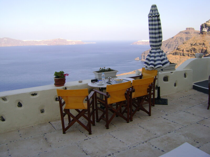 Ocean view terrace with yellow chairs