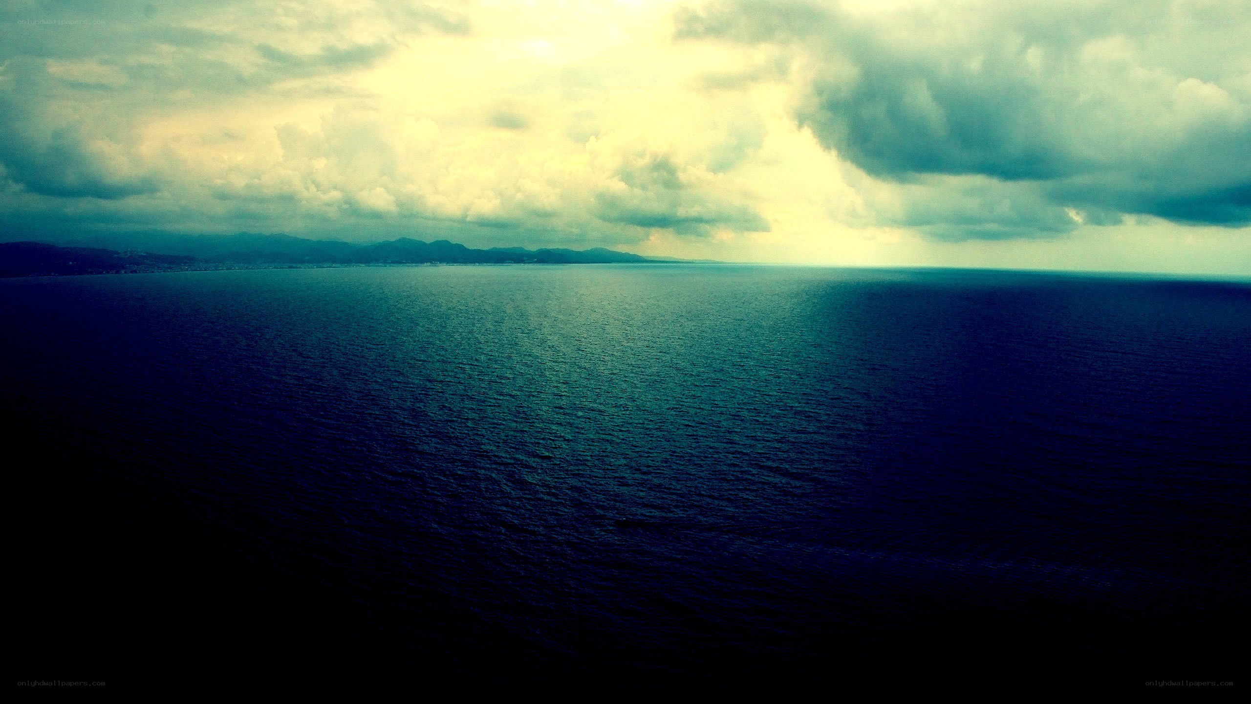 Ocean view under cloudy sky