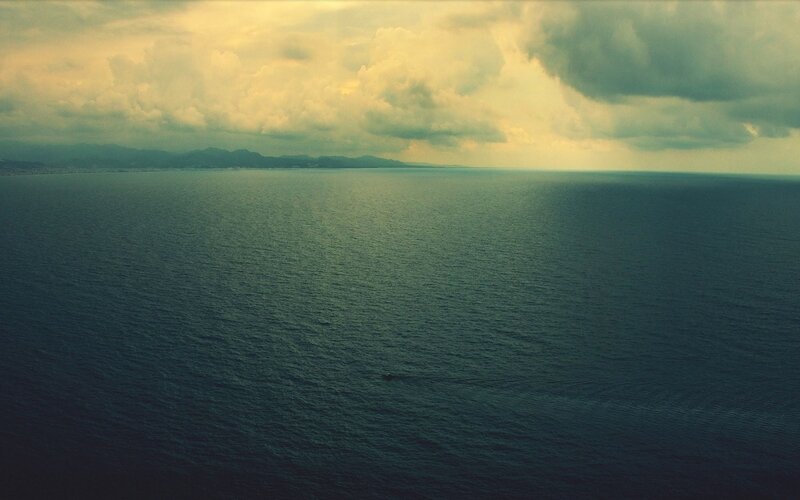 Ocean view with distant mountains