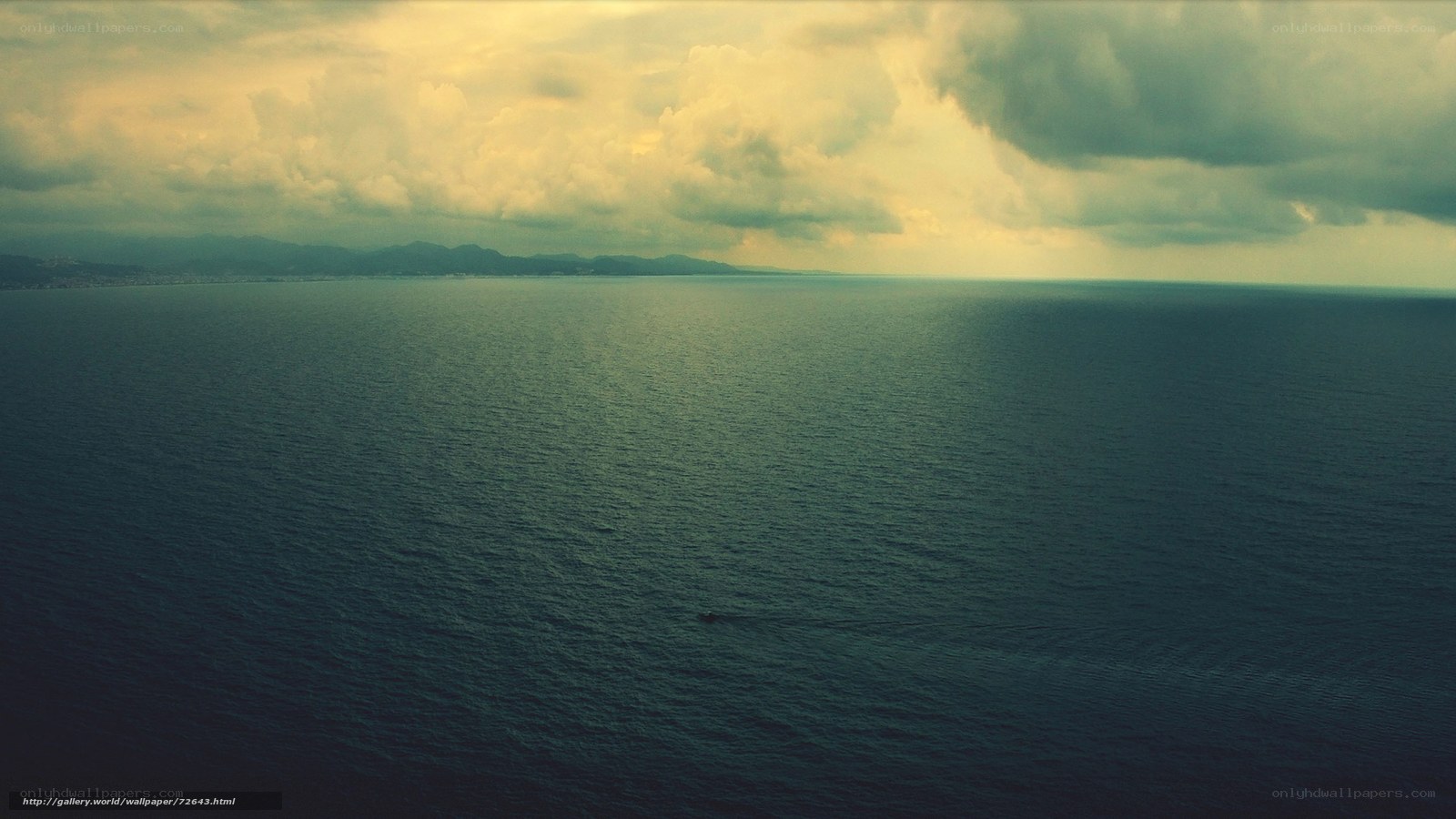 Ocean view with distant mountains
