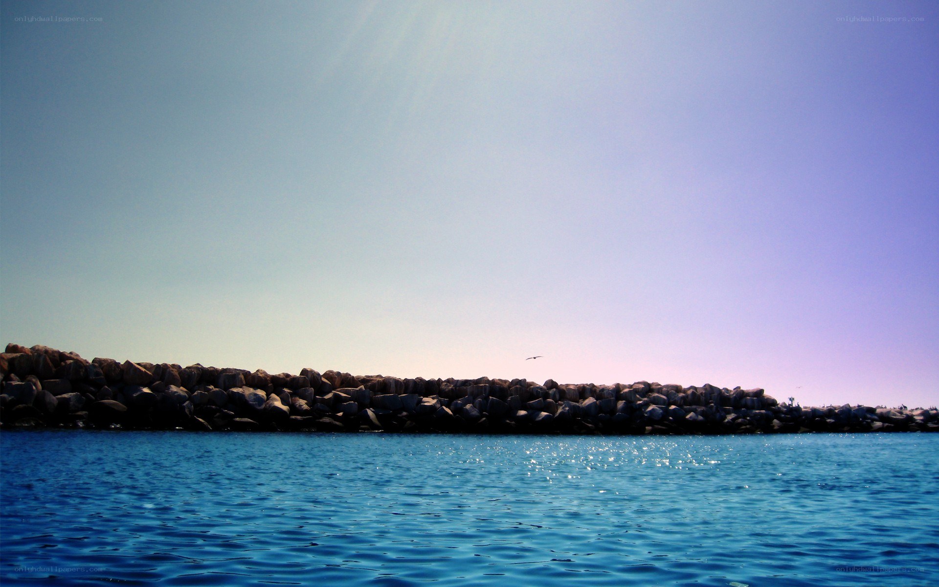 Ocean view with rocky breakwater