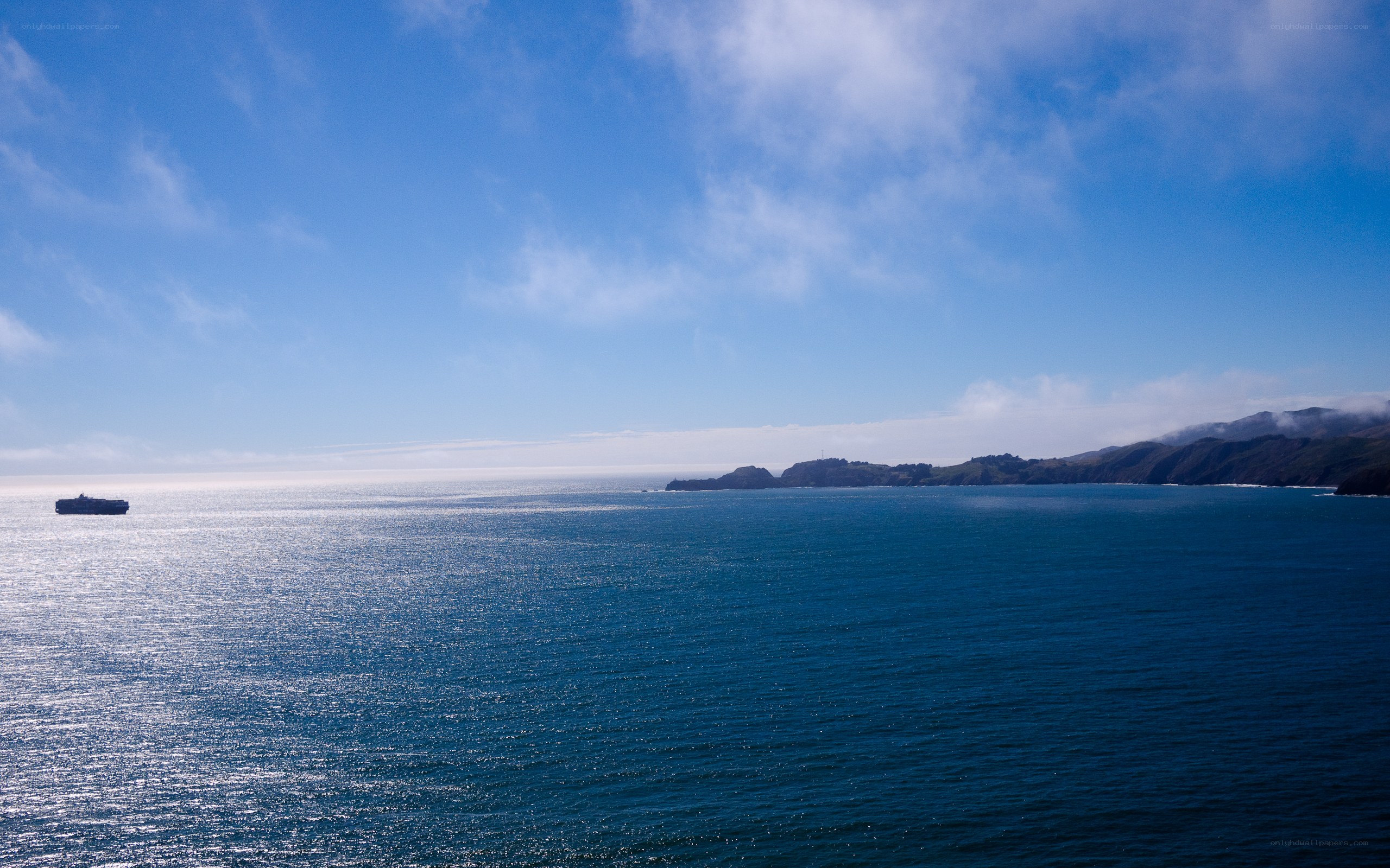 Ocean view with ship and coastline