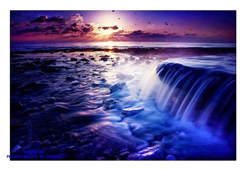 Ocean Waterfall at Sunset — Blue, Dramatic, Photograph, Sun, Clouds