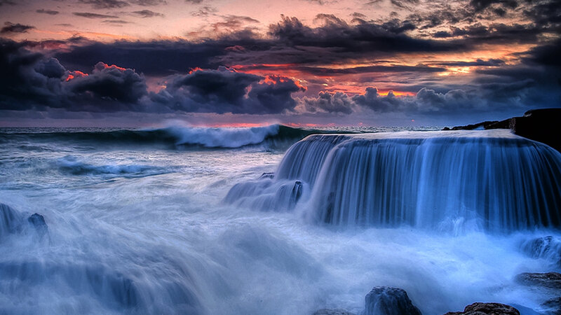 Ocean Waterfall at Sunset — Blue, Dramatic, Photograph, Waves