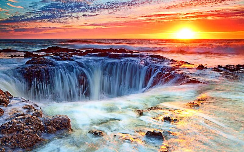 Ocean Waterfall at Sunset — Orange, Dramatic