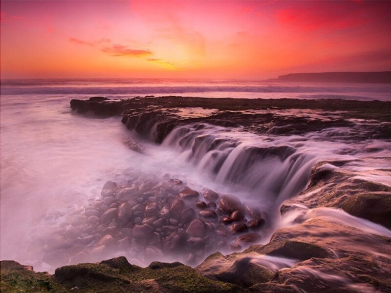 Ocean Waterfall at Sunset — Pink