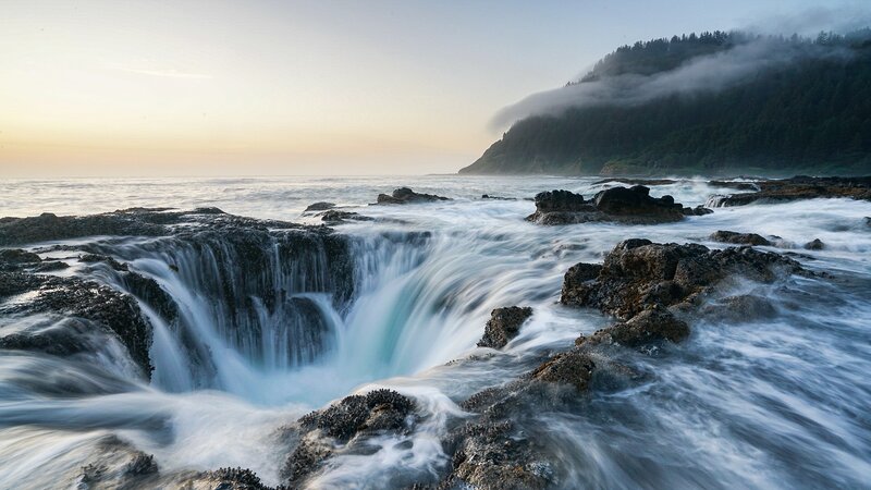Ocean Waterfall on Rocks — Blue, Dramatic