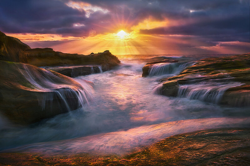 Ocean Waterfalls at Sunset — Orange, Dramatic