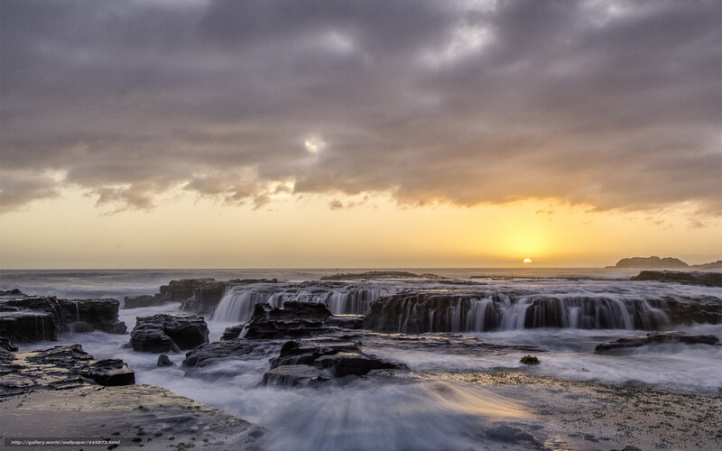 Ocean Waterfalls at Sunset — Yellow, Dramatic, Photograph, Rocks