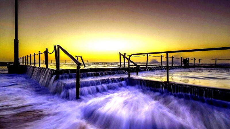 Ocean Waterfalls at Sunset — Yellow, Dramatic, Photograph
