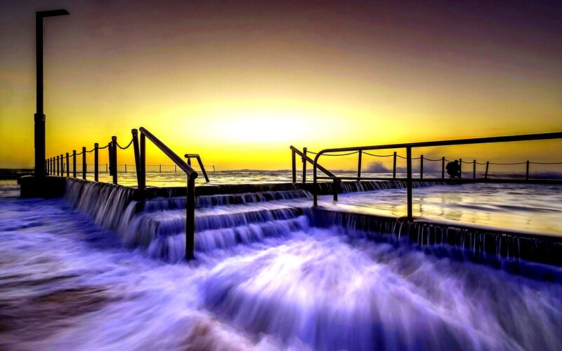 Ocean Waterfalls at Sunset — Yellow