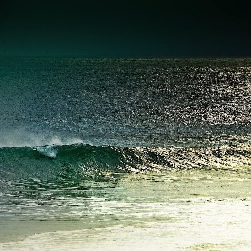 Ocean wave at dusk