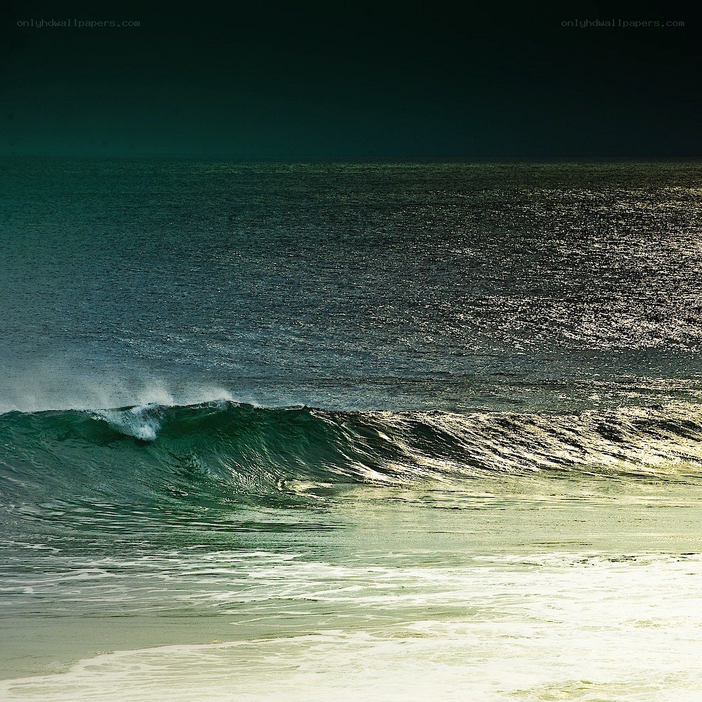 Ocean wave at dusk