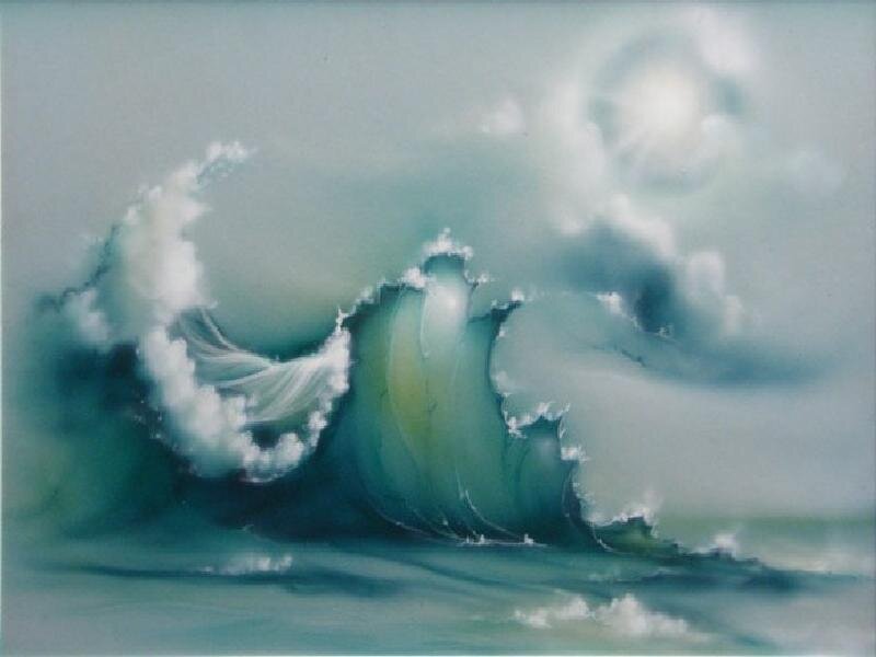 Ocean wave at sunset