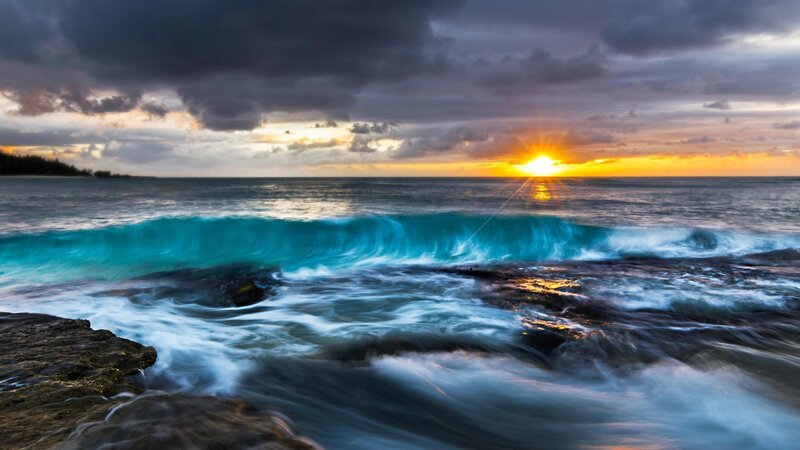 Ocean Wave at Sunset — Blue, Dramatic, Photograph, Sun, Clouds, Rocks