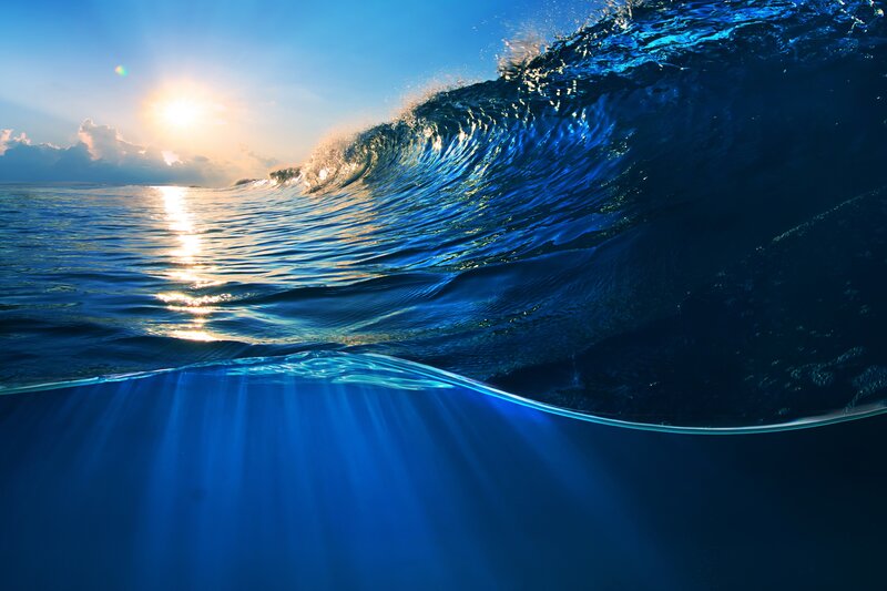 Ocean Wave at Sunset — Blue, Dramatic, Photograph, Sun, Sky, Clouds
