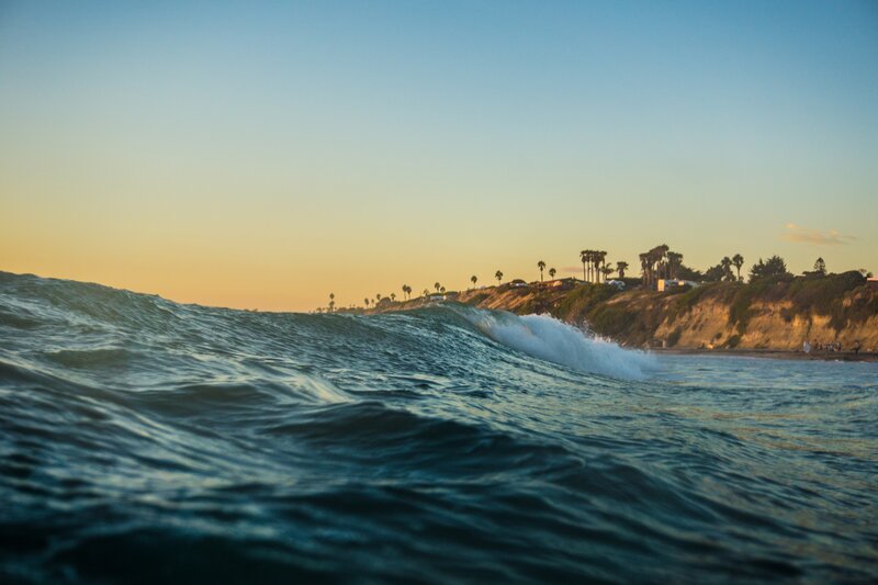 Ocean Wave at Sunset — Blue, Serene, Photograph, Cliff