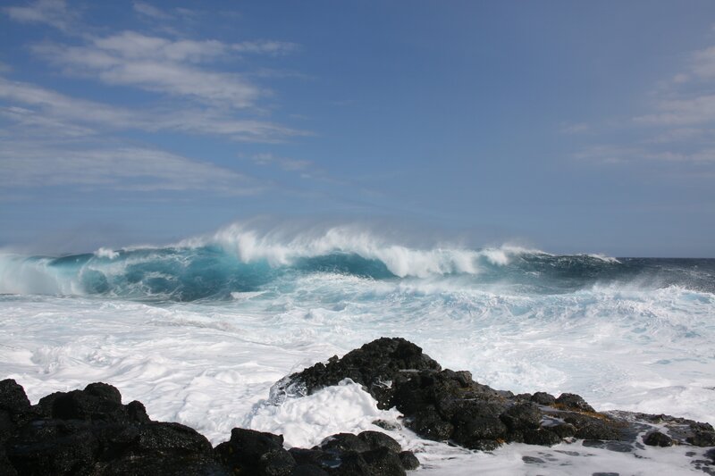 Ocean Wave Crashing on Rocks — Blue, Dramatic, Afternoon