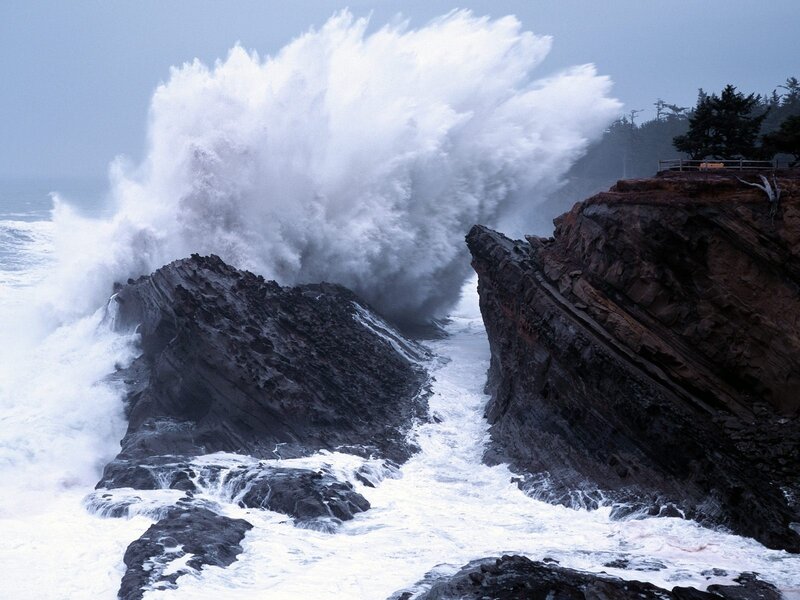 Ocean wave crashing on rocks