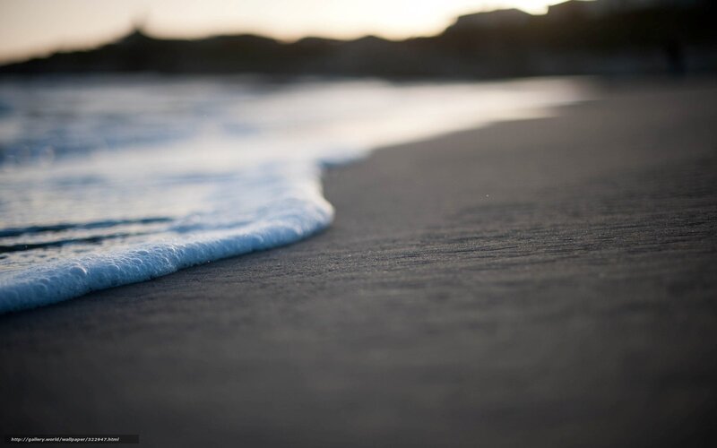 Ocean wave on sandy beach
