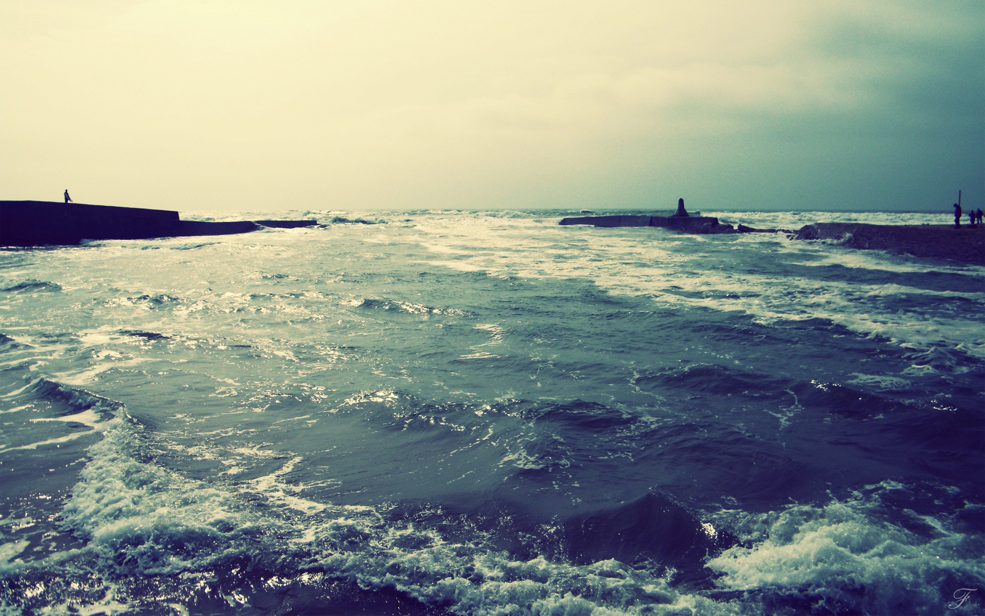 Ocean waves at a breakwater