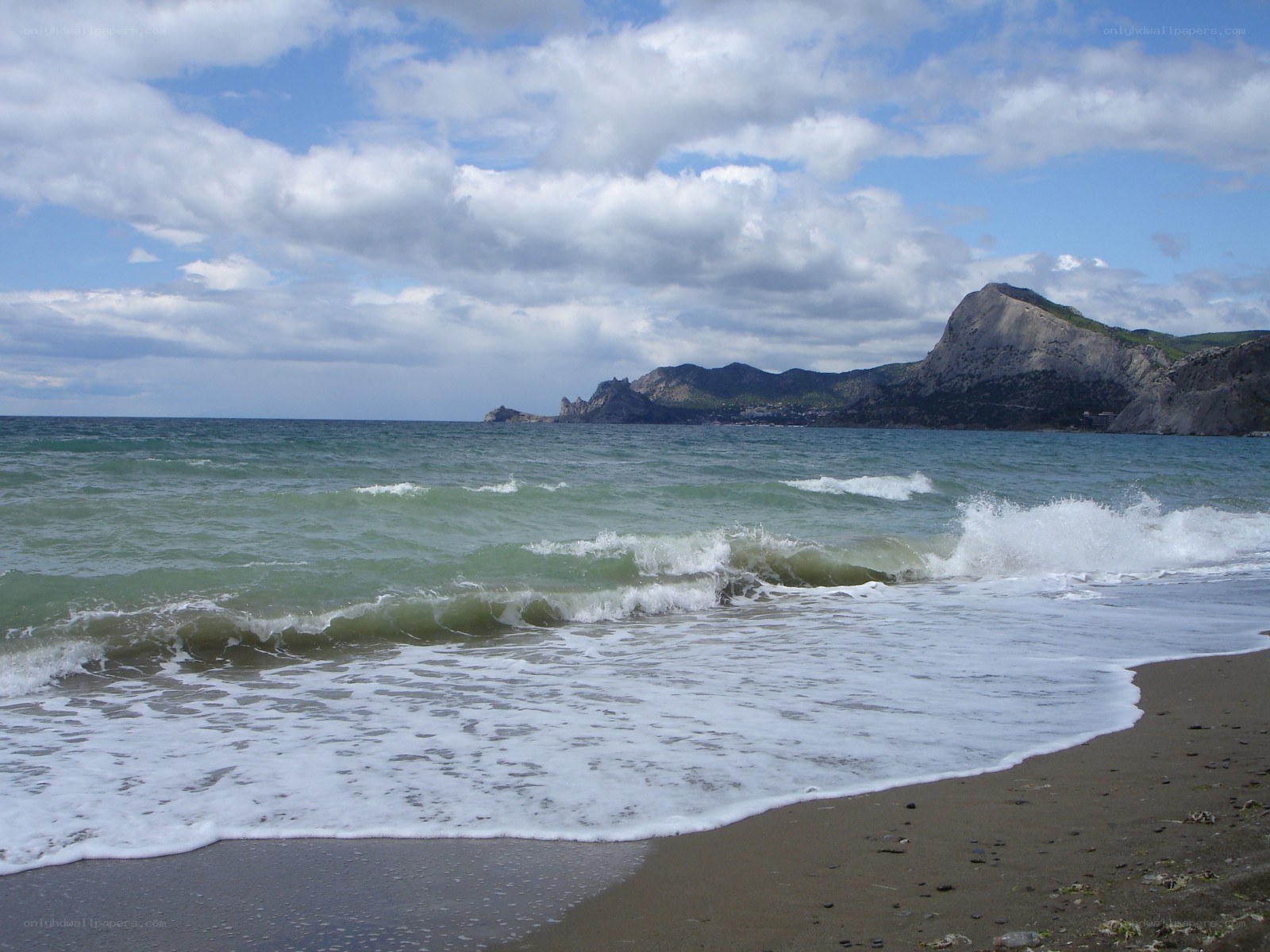 Ocean waves at a rocky beach