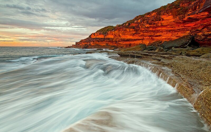 Ocean Waves at Cliff Base