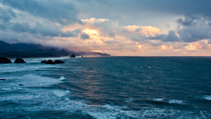 Ocean Waves at Coastline — Blue, Dramatic, Sunset, Photograph