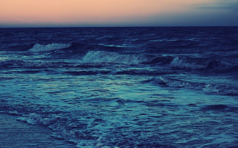 Ocean waves at dusk