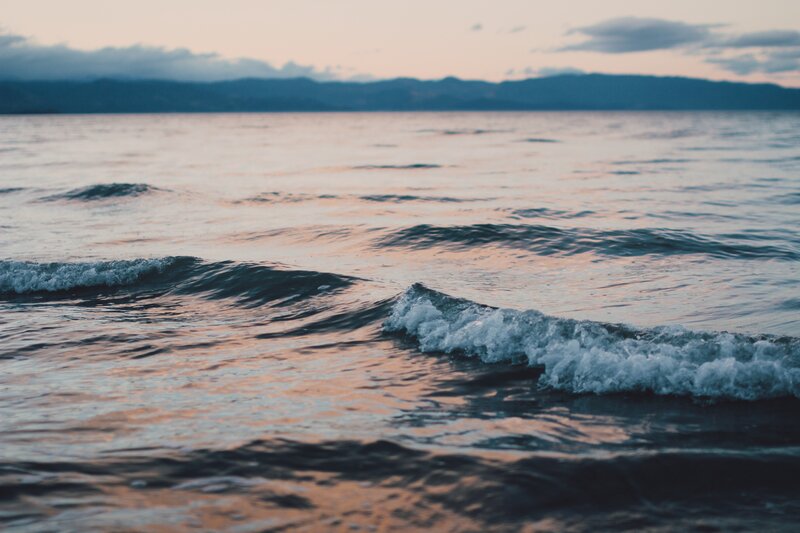 Ocean Waves at Dusk — Blue, Serene, Sunset