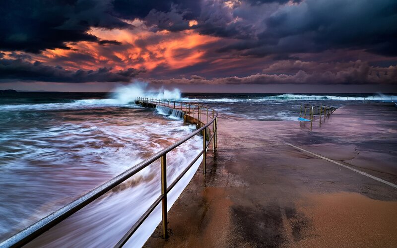 Ocean Waves at Pier — Orange, Dramatic, Sunset