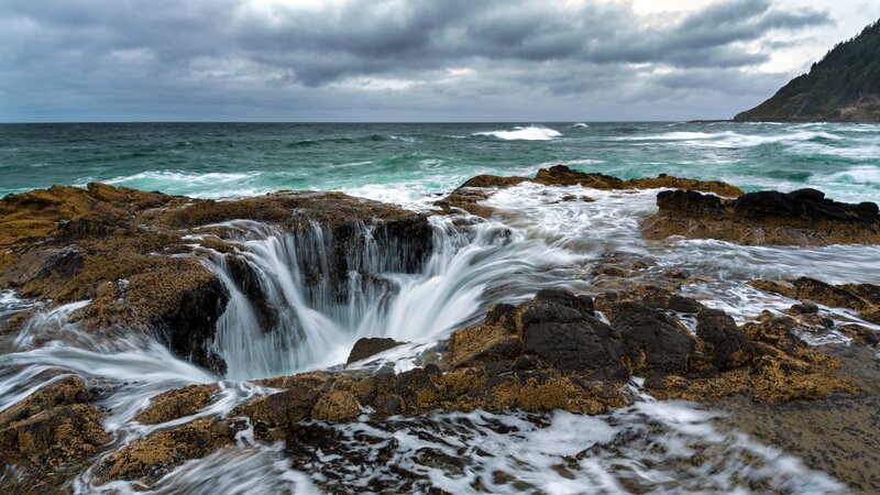 Ocean Waves at Rock Formation — Green
