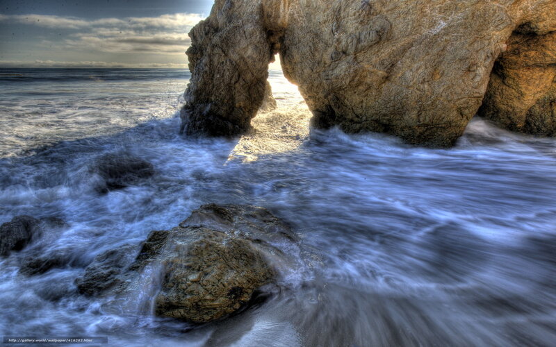 Ocean waves at sea arch