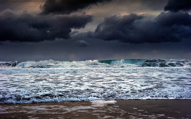 Ocean Waves at Stormy Sky