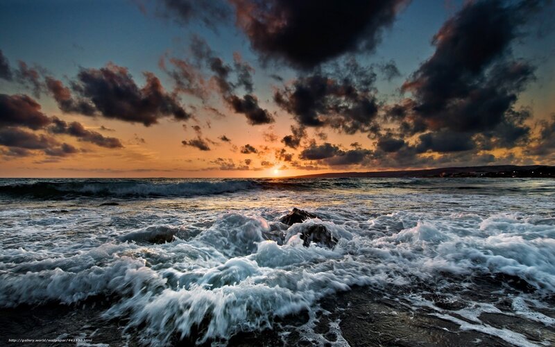 Ocean waves at sunset