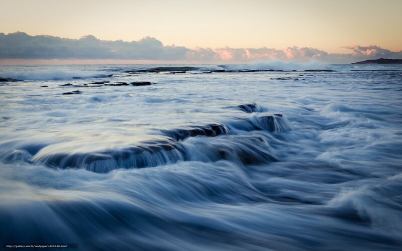 Ocean waves at sunset
