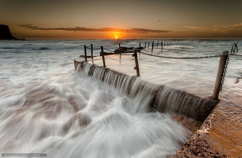 Ocean waves at sunset