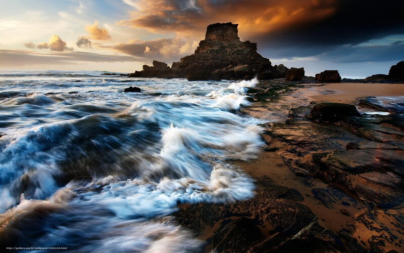 Ocean waves at sunset