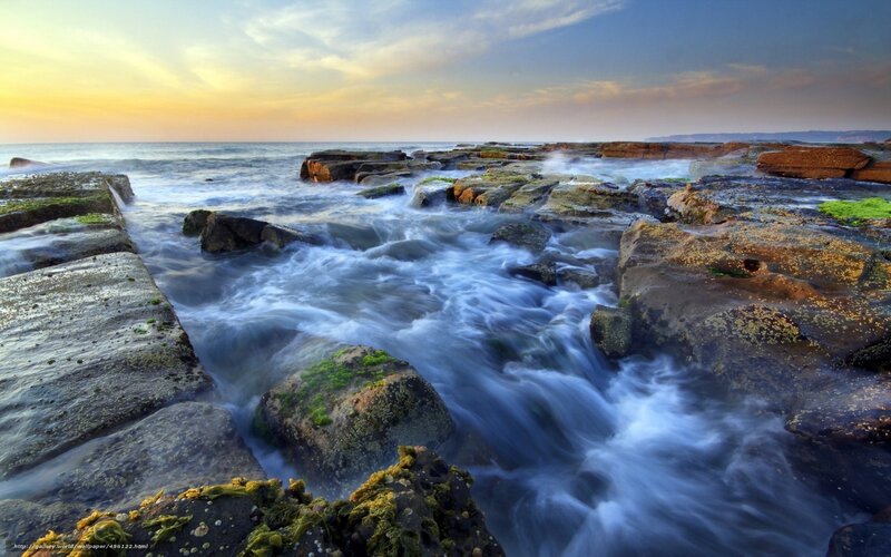 Ocean waves at sunset