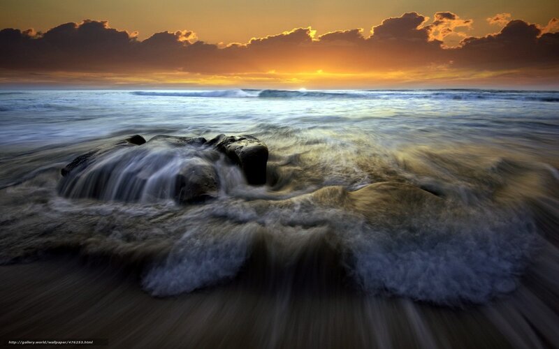 Ocean waves at sunset