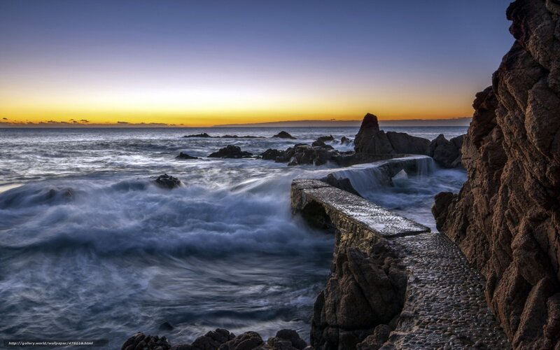 Ocean waves at sunset